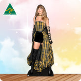 Cardboard cutout of a person wearing a plaid dress and black boots with 'Australian Made' logo.